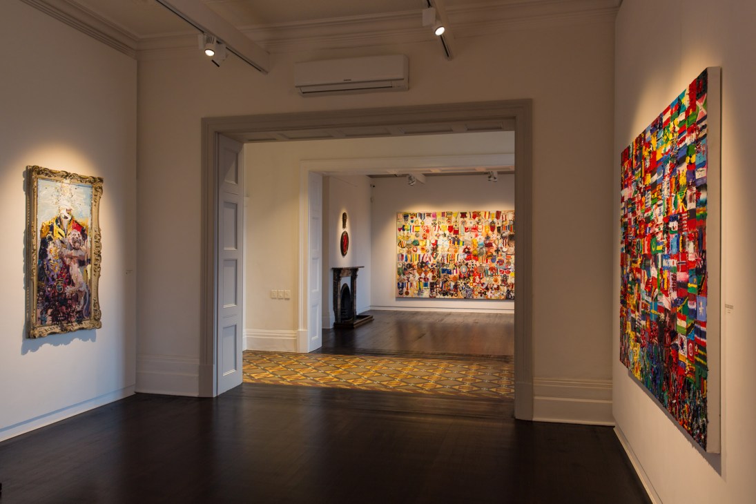 Interior of Everard Read gallery showing white walls, framed artworks, and colorful contemporary paintings on display.
