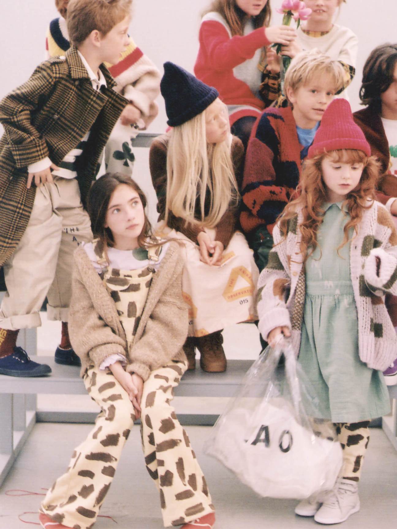 Group of children wearing colorful patterned clothing from The Animal Observatory brand