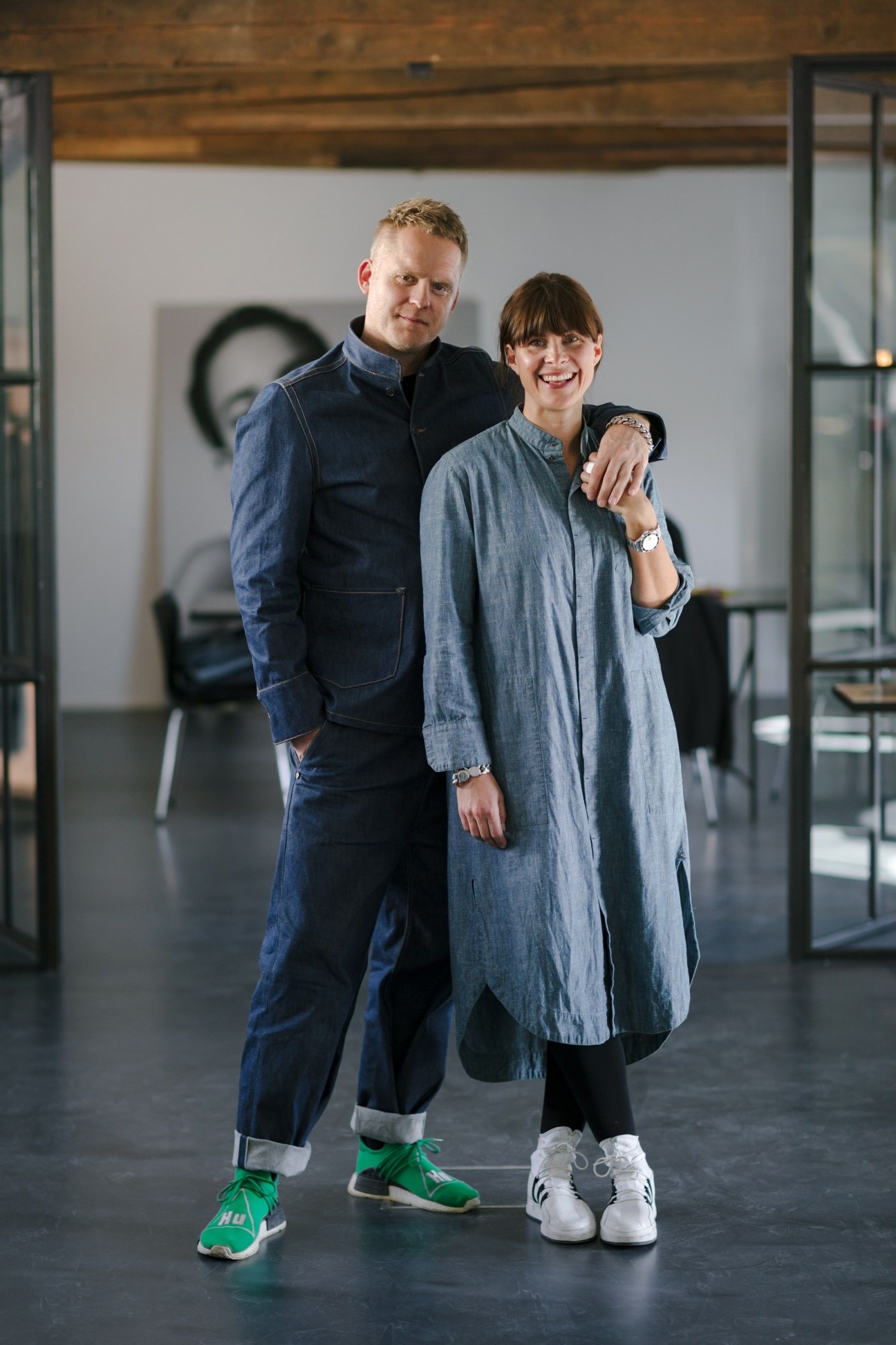 Tom Wood's Morten Isachsen and Mona Jensen posing together in a modern loft space.