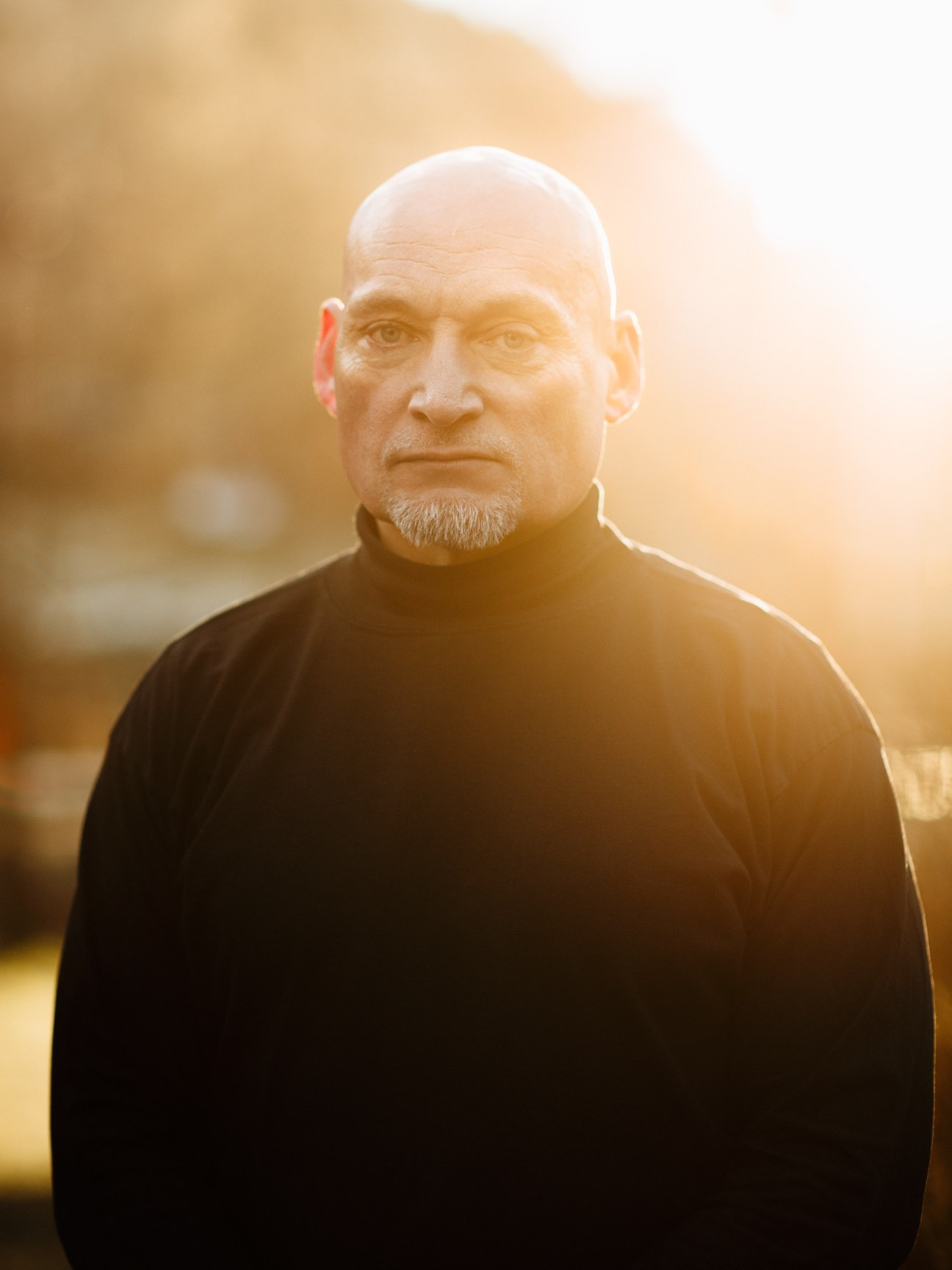 Portrait of Pål S Refsdal, a Norwegian film-maker, outdoors with golden hour lighting.